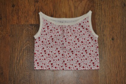 Cotton boat-necked heart print top edged in white jersey. Chest size 20/21", approximately 1-2 years. £8 + p&p.